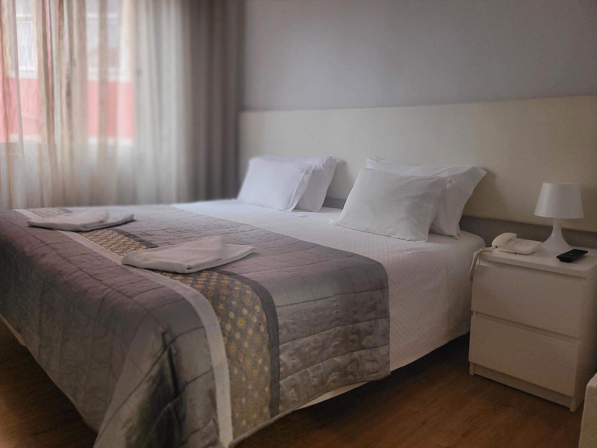 Hotel Residencial Valentina Lissabon Exterior foto A bedroom in a hotel